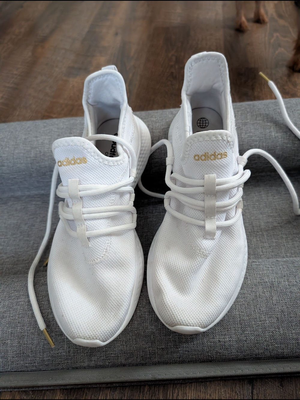 adidas Women’s White Sneakers with Gold Accents